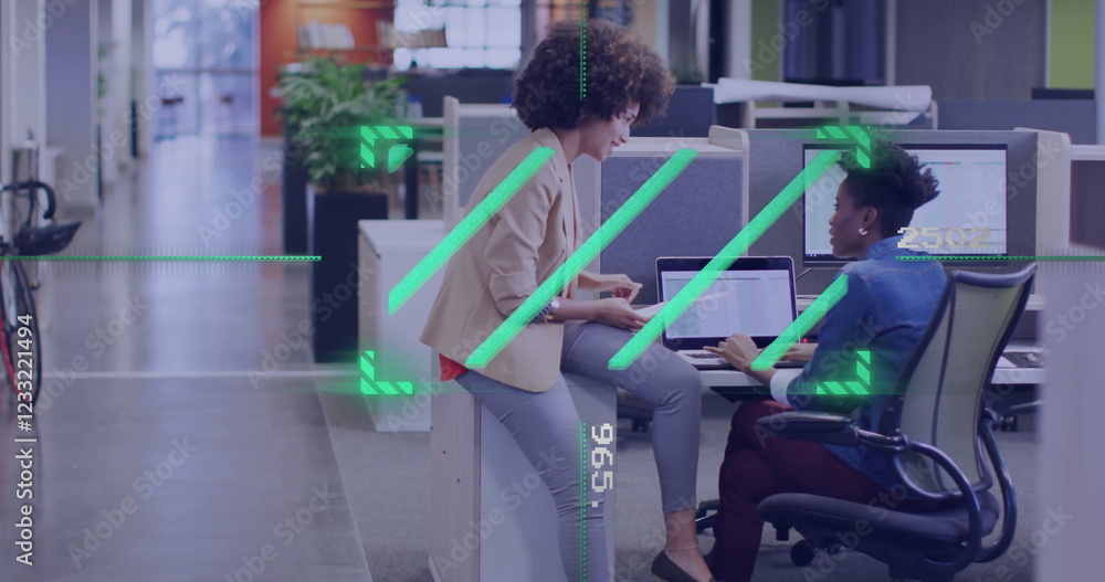 Aufkleber discussing project over computer, colleagues in office with digital image overlay