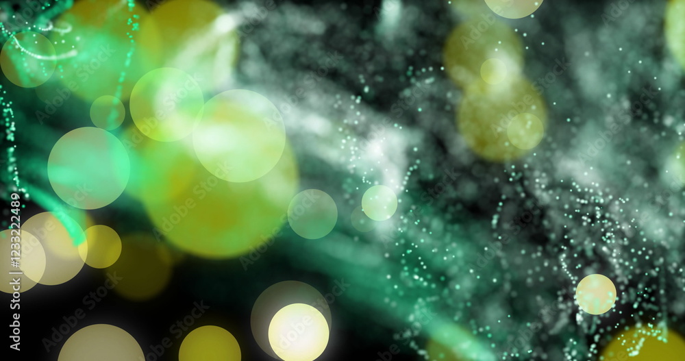 Poster abstract image with green and yellow particles floating over dark background