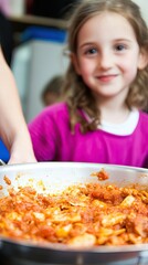 Girl watching cooking class food preparation
