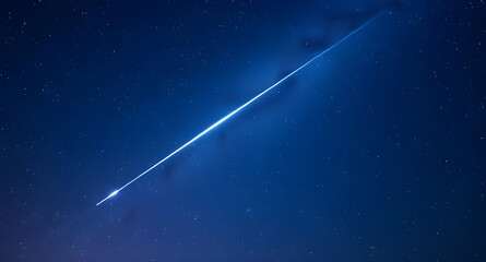 Shooting star on night sky