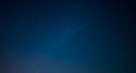 Shooting star on night sky