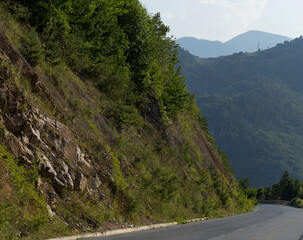Rhodopes, are a mountain range in Southeastern Europe. Bulgaria. Panorama. The forest area covers the mountains.