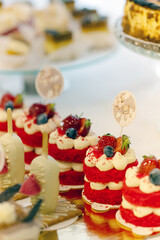 Red mini cream cake, sweet table, sweet snacks