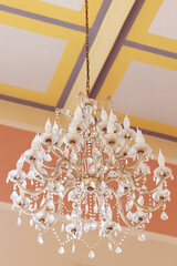 Baroque chandelier with crystals, baroque interior details