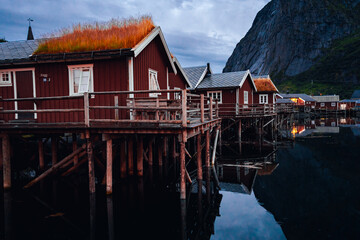 Charming Wooden Cabins by the Serene Water in Beautiful Norways Idyllic Landscapes