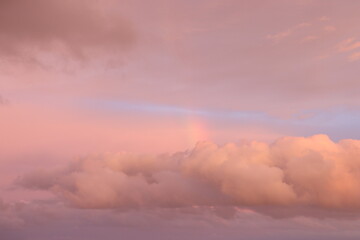 Rainbow and clouds in the sky