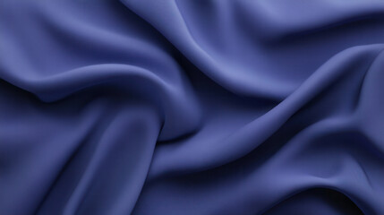 Obraz premium Blue Satin Drape: A rich, deep blue satin fabric forms luxurious, flowing folds, creating a sophisticated backdrop for your design projects. The soft light illuminates the smooth, lustrous surface.
