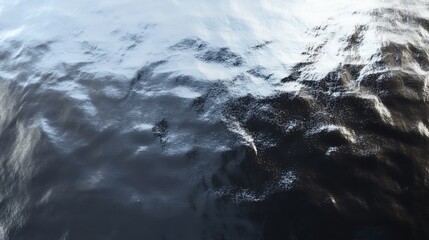 Fototapeta premium Abstract glistening surface with dark and light tones creating a wavy effect