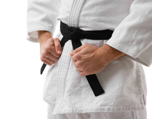 Karate fighter in uniform on white background, closeup