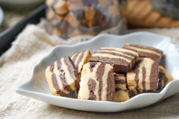 A plate of Striped Butter Cookies atau Biskut Belang.  Butter cookies are popular served during Hari Raya (Eid Mubarak) in Southeast Asia countries.