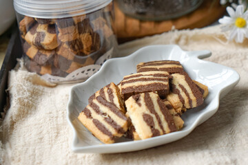A plate of Striped Butter Cookies atau Biskut Belang.  Butter cookies are popular served during Hari Raya (Eid Mubarak) in Southeast Asia countries.