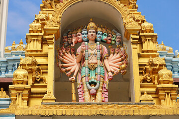 The multi-headed cosmic form of Vishnu or Krishna on a Hindu temple in Kuala Lumpur, Malaysia.