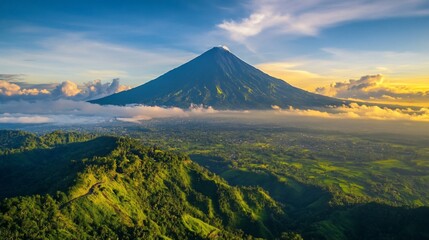 Fototapeta premium Majestic Mountain Vista at Sunrise with Rolling Hills and Atmospheric Clouds