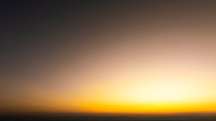 Enjoy panoramic views of the skyline . Sunset in the evening sky with colorful clouds and beautiful cloud patterns Amidst the soft golden light	