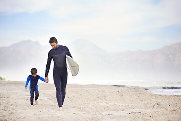 Surfboard, father and son holding hands on beach for weekend bonding, travel holiday and outdoor fun. Ocean, child and dad walking on surf vacation with support, happy adventure and space in nature