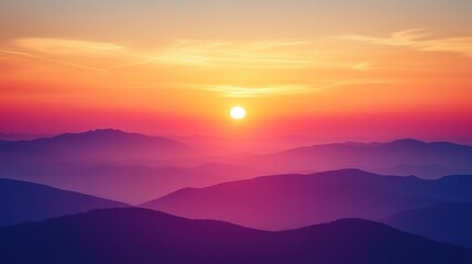 Majestic sunset over misty mountain range