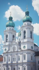 Fototapeta premium Twin-towered church under a blue sky