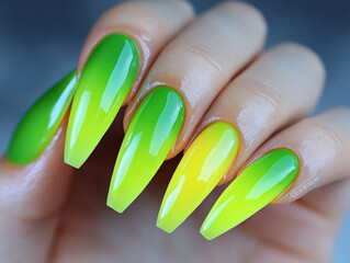 Long neon green yellow gradient nails vibrant ombre manicure bold glossy acrylic art bright fashion stylish modern beauty trend close up photography hand model salon look chic fake tips glam edgy