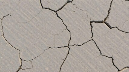 Obraz premium Rough and weathered stone surface with natural cracks and patterns, natural, rock