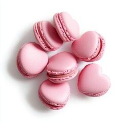 Obraz premium Pink heart-shaped macarons on white background.