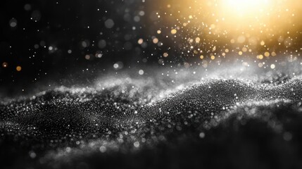A close-up view of sparkling particles against a dark background.