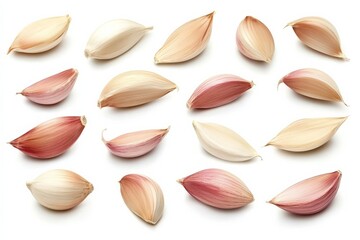 An artistic arrangement of garlic cloves, emphasizing their shape and color isolation.