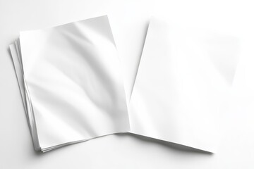 A collection of neatly folded white sheets of paper.