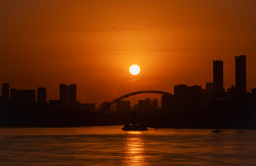 Fototapeta premium Sunset Over Han River Bridge and Wuhan Skyline, China