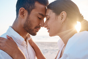 Fototapeta premium Beach, couple and bonding with love on vacation, travel holiday and connection on valentines day. Soulmate, man or woman with admiration embrace for relationship, dating or romantic with hug by flare