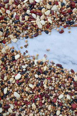 Mixed dried legumes: peas, lentils, beans, haricot, buckwheat, chickpea. food texture background, Top view image.