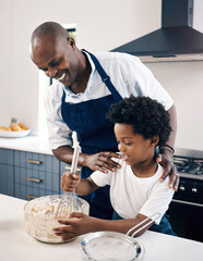 Learning, baking and father with child in kitchen for mixing ingredients for cake, muffins or cookies. Happy, bonding and African dad teaching boy kid cooking skills for development in family home.
