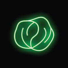 Green neon sign illustrating cabbage vegetable, emitting bright light in the dark