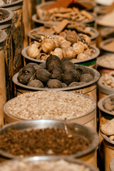 Colorful assortment of dried fruits and nuts displayed at a marketplace showcasing local flavors and healthy snacks
