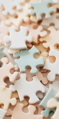 Close up of Pastel Colored Jigsaw Puzzle Pieces in Soft Focus