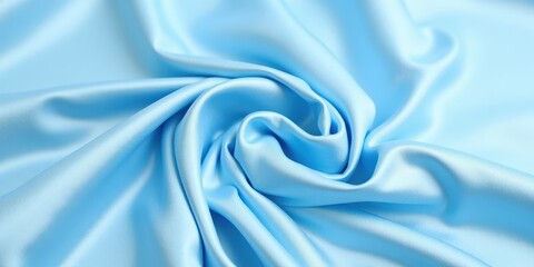 Fototapeta premium Close-up of light blue satin fabric exudes smooth silkiness and subtle sheen against a similar hue backdrop, highlighting its elegant texture