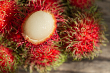 Fresh rambutan sweet fruit on table with top view picture. Selective focus