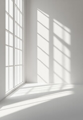 A clean, white room with sunlight streaming in through the window modern empty interior
