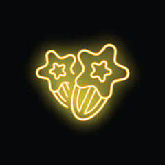 Bright yellow neon sign depicting two starfruit, shining on a black background