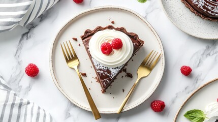 Chocolate tart slice with whipped cream and raspberries on a plate.