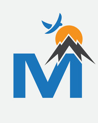 Initial Monogram Letter M Vacation Logo Concept With Mount, Sun and Bird Symbol. Travel Logotype