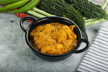 Spicy chicken masala in the bowl