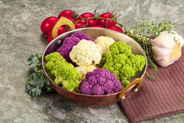 Raw cauliflower different colors heap