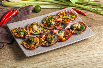 Baked scallops with scalion oil