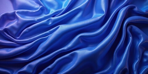 Fototapeta premium Deep, vibrant blue satin glistens with a smooth, glossy texture, revealing its rich, silky elegance in captivating detail