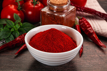 Spicy dry paprika powder in the bowl