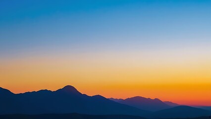 Fototapeta premium the sun setting on a beach with mountains in the background, near a small beach