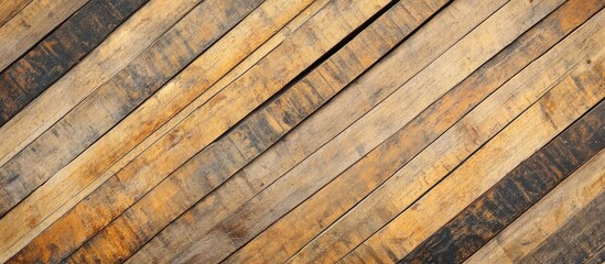 Wooden planks arranged diagonally in varying shades of brown with a textured surface and Copy Space for text placement