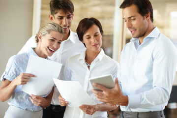 Happy, business people and documents with tablet for project discussion, meeting or proposal at...