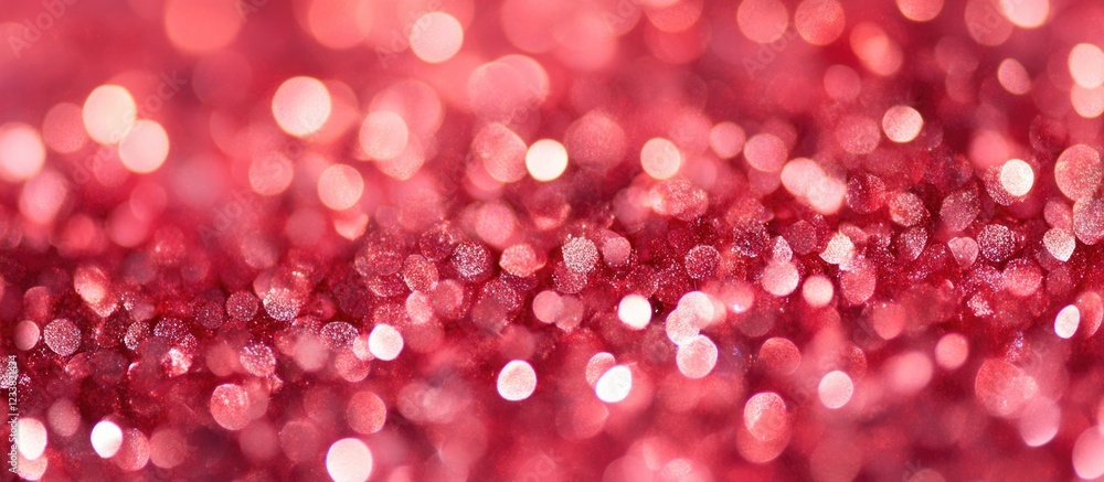 Poster red glitter bokeh abstract background with defocused sparkling highlights