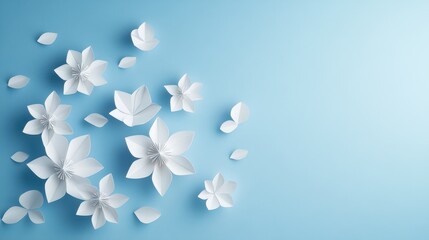Elegant winter paper cut design featuring white blooming flowers on a serene blue background.